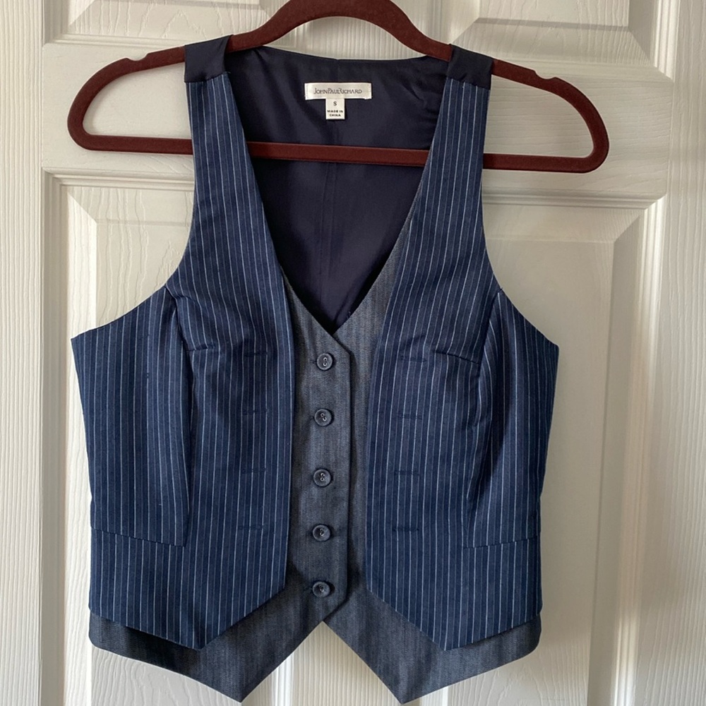 Dark blue vest with white and gray pinstripes.